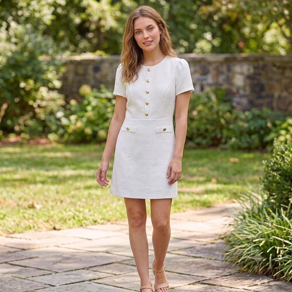 Andrew Marc size 4 white nubby dress. Gold tone buttons.